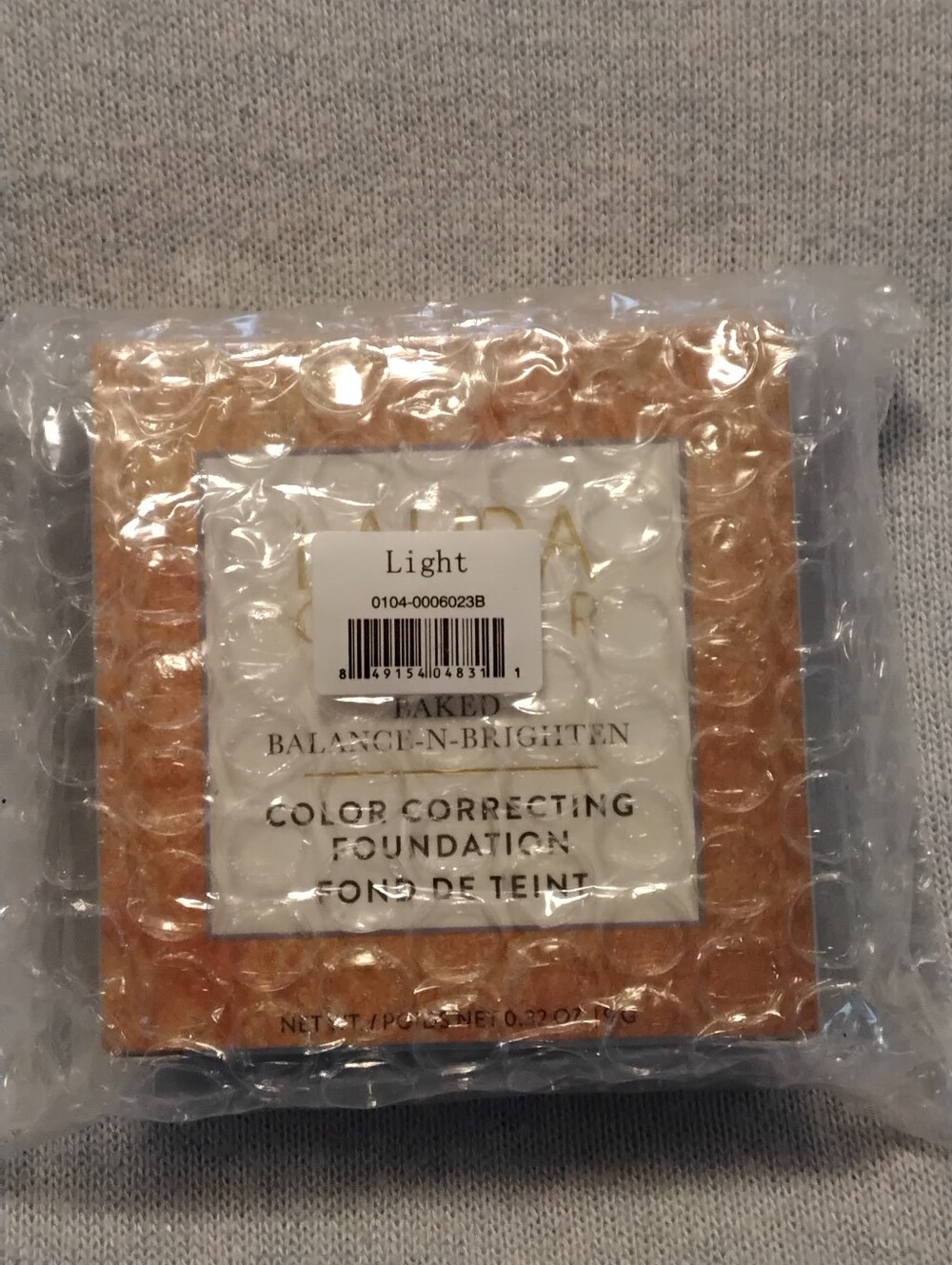 Laura Geller Baked Balance-n- Brighten Color Correcting Foundation - Light